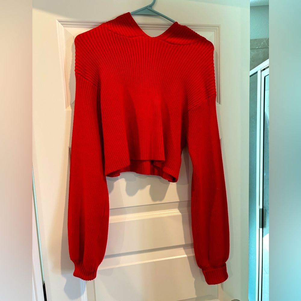 Oliviaceous sweater. A tad cropped. Flattering fit.
